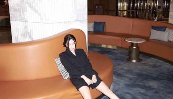 woman sitting in the lobby of Mondrian Seoul