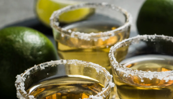 three cocktails and a lime