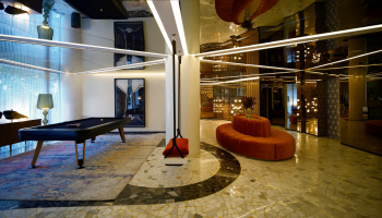 Mondrian Mexico City Condesa Lobby with pool table, swing, and couch 