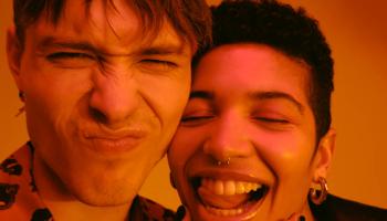 two people making funny faces for the camera